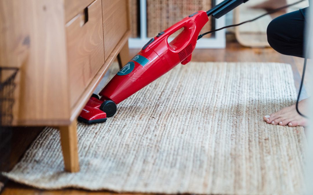 using vacuum to clean carpet